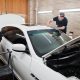 repairing a car in the garage