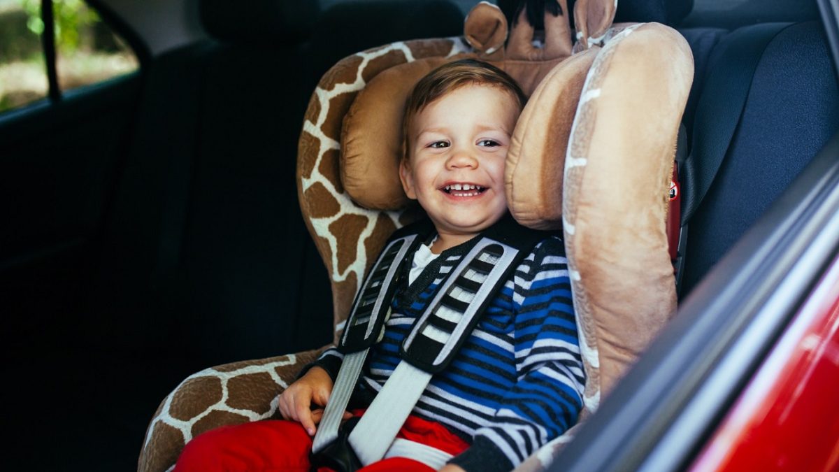 child seated in a car seat