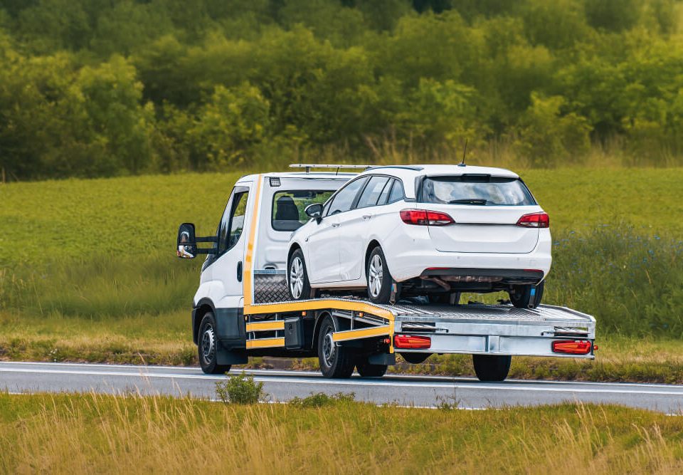 towing with a flatbed tow truck